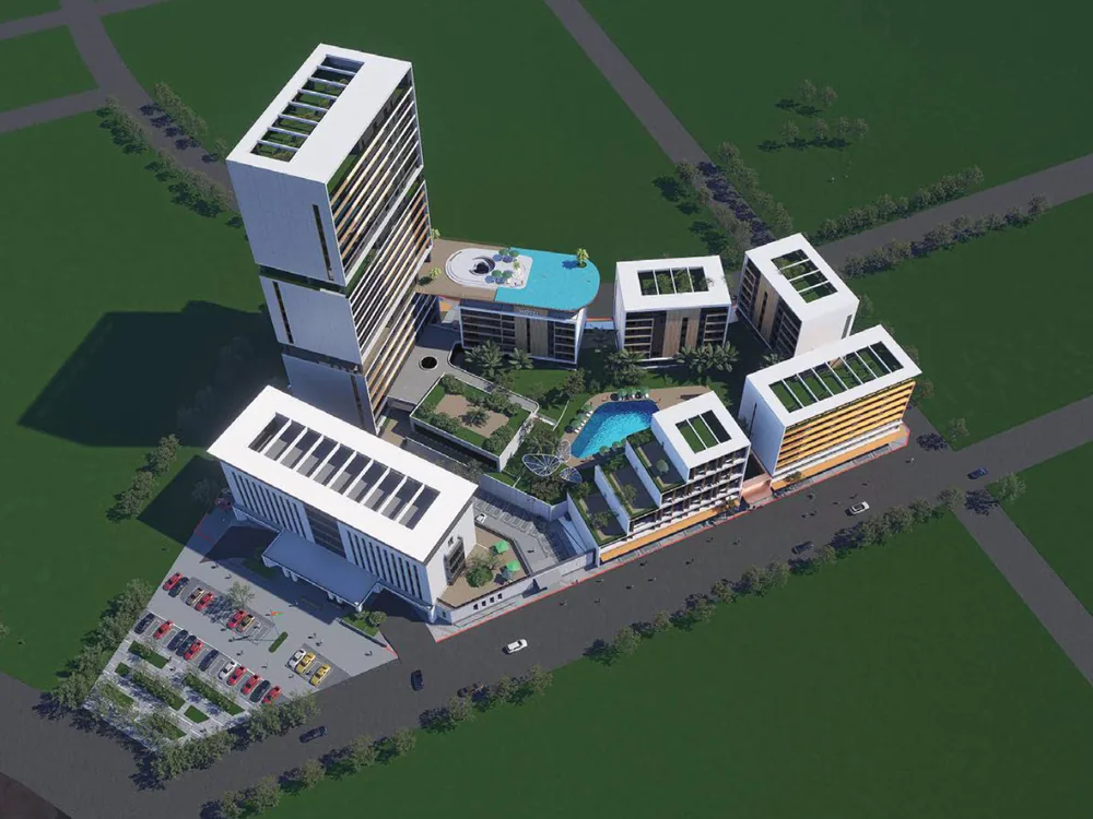 Aerial view of a mixed-use complex with hotel, offices and planted courtyards