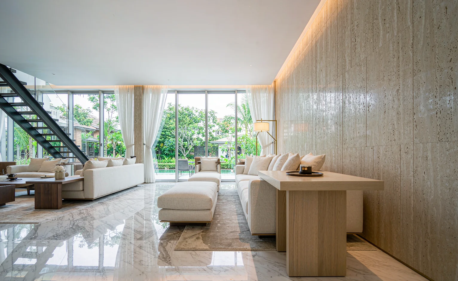 Natural stone in a hot-climate villa — marble floor and travertine feature wall - Natural Stone for Hot Climates: Marble & Granite Guide