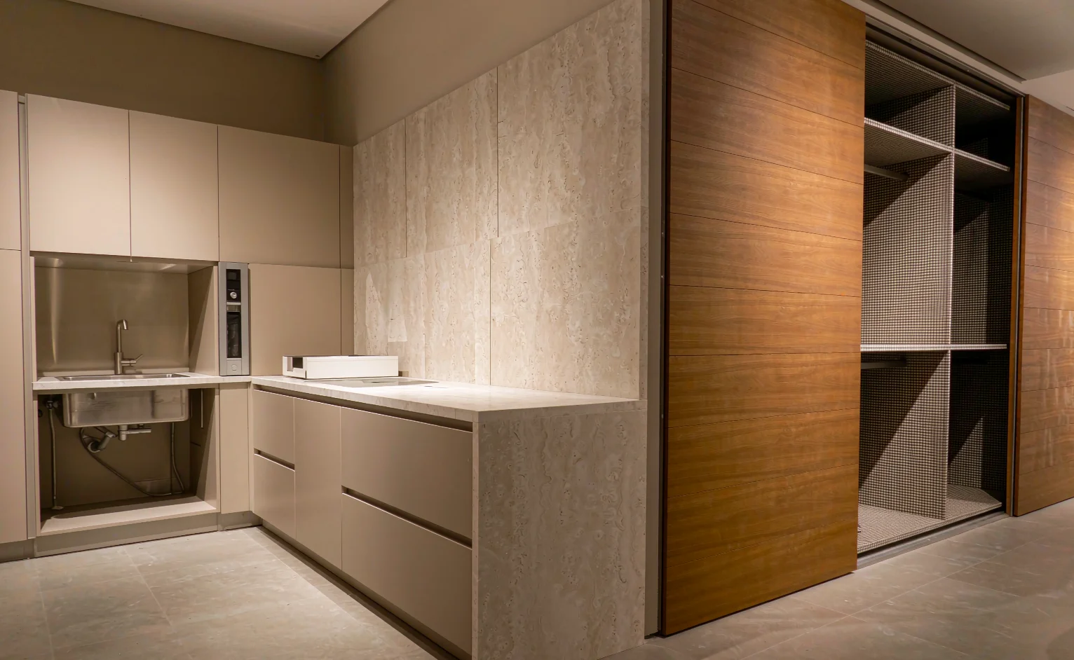 Modern modular kitchen and wardrobe cabinetry showroom with matte laminate doors and wood veneer wardrobe
