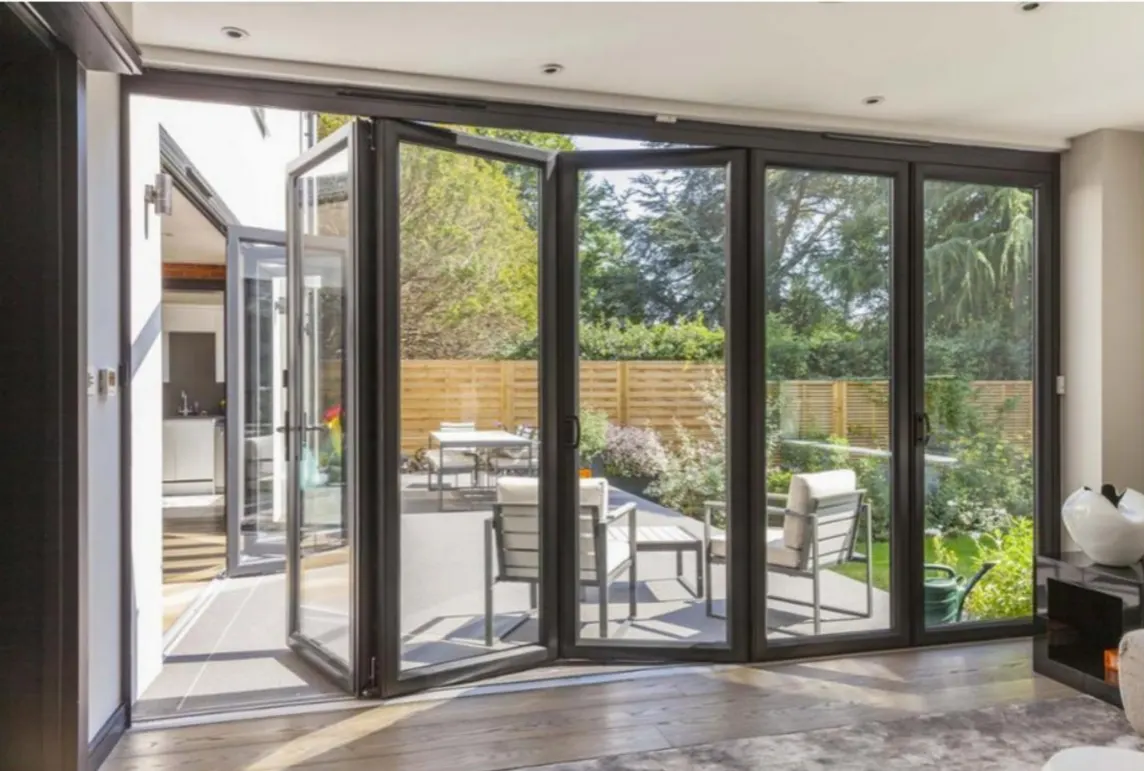 Aluminium bi-fold doors and glazing built for tropical heat, dust and storms, supplied from Foshan, China